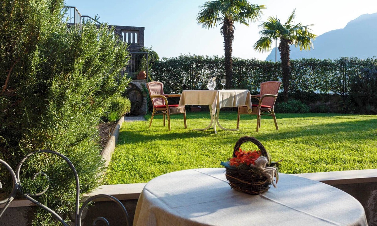 Torbole sul Garda Apartment | BEUST HOUSE - VALERIA - Terrace and garden - view of olive trees and lake