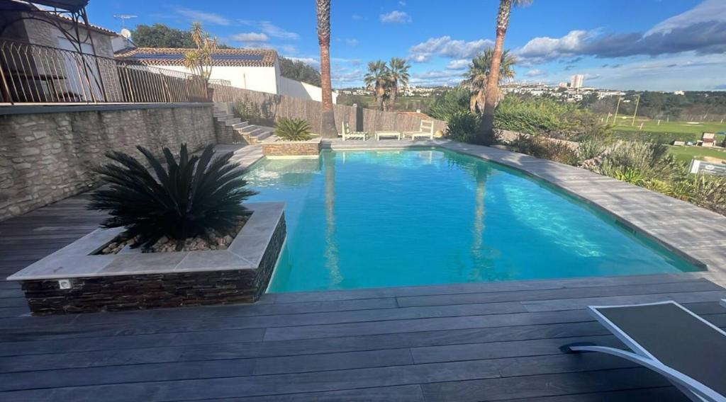 Ecusson Apartment | Le repère des golfeurs - Piscine & Clim
