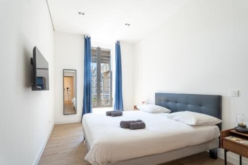Centre Ville-Gare House | Maison Rouget - Chambre 3 - Le Palmier