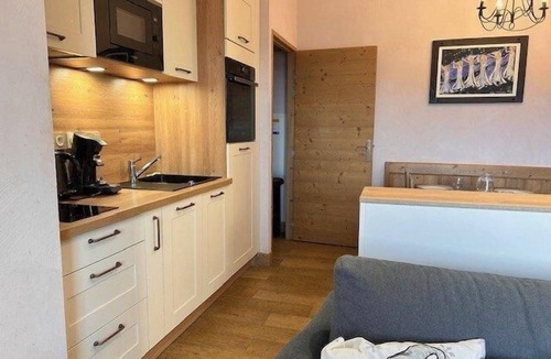 Risoul Apartment | 300m from resort center, 3rd floor, view ski slopes, swimming pool, sauna, balcony, tv, ski locker