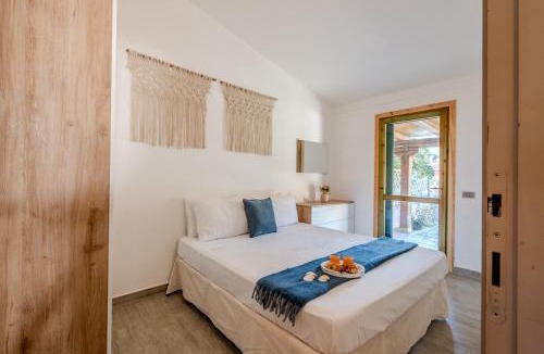 Case Peschiera-Lu Fraili Apartment | 5min dalla Spiaggia La Cinta - Villetta Elegante a San Teodoro