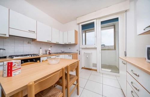 Colugna Apartment | A comfortable and welcoming 60 square meters apartment, perfect for four people, located on the fourth floor of a period building without an elevator.The property is located in a quiet area, allowing our guests to easily and quickly reach the center of U