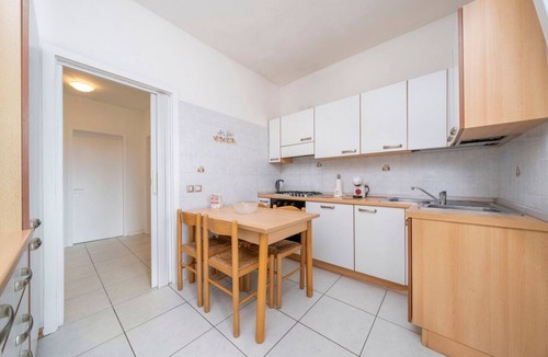 Colugna Apartment | A comfortable and welcoming 60 square meters apartment, perfect for four people, located on the fourth floor of a period building without an elevator.The property is located in a quiet area, allowing our guests to easily and quickly reach the center of U