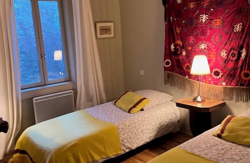 Saint-Etienne-du-Gres Cabin | A comfortable cabin in a quiet, natural setting, with air conditioning and a fan; swimming pool