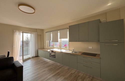 Campiglione Fenile Apartment | ACQUA Apartment Modern comforts and bright surroundings