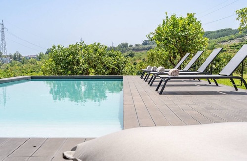 Coste House | Avocado Garten by Interhome