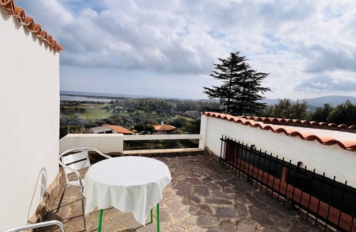 San Teodoro House | Camera Nettuno - Villa Flores