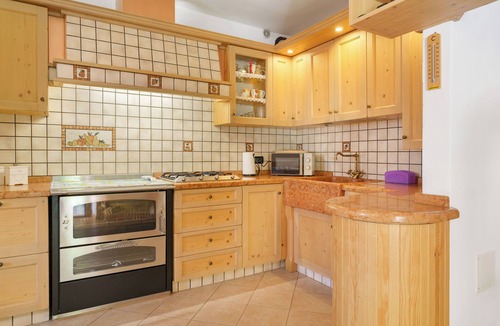 San Lorenzo in Banale Ski Chalet | Chalet 'Camillo' with Mountain Views, Private Pool and Garden