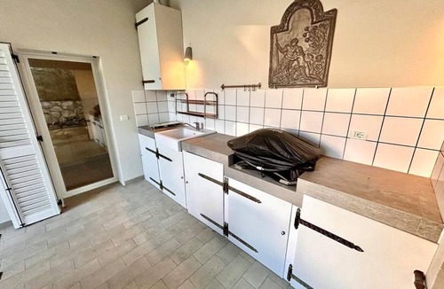 Villaggio Taunus Villa | Delightful cottage with garden and terrace overlooking the sea