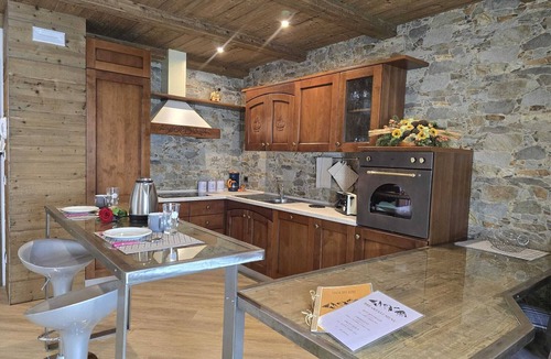 Valtellina Ski Chalet | Exclusive rustic chic chalet with large furnished rooftop garden