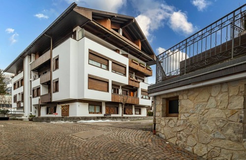 Cortina d'Ampezzo Historic Centre Apartment | GuestHost - Charming 45 sqm apartment, with fine wooden finishes and mountain view, ideal for two guests, located on the 4th floor of a characteristic building. The property is located in the heart of Cortina, along the famous Corso Italia, a 7-minute wa