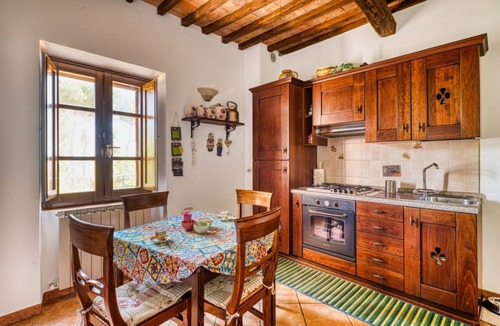 Passignano sul Trasimeno Apartment | GuestHost - Cosy flat equipped with all comforts to comfortably accommodate up to 3 people. The accommodation is located in a renovated former oil mill, which offers its guests numerous shared facilities: access to the seasonal swimming pool, green area