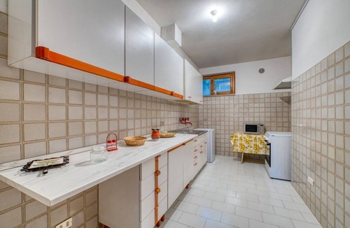Perugia Apartment | GuestHost - Spacious and comfortable apartment of approximately 200 sqm, accommodating up to four people, located on the lower ground floor of a villa (accessible by steps).The property is located in a residential area surrounded by greenery, about a 15-