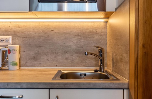 Chifa Apartment | Holiday Apartment 'Alpennest' with Mountain View, Shared Garden and Wi-Fi