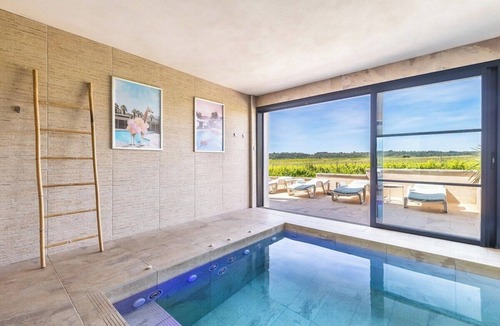 Plaissan Villa | Luxury villa with heated indoor pool/spa, exceptional vineyard views, 4-star rating