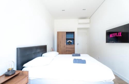 Centre Ville-Gare House | Maison Rouget - Chambre 3 - Le Palmier