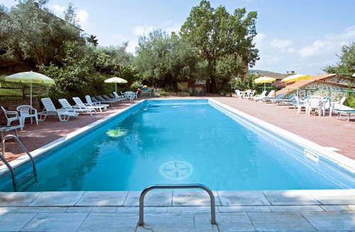 Paciano Apartment | Nice apartment for 7 guests with pool, WIFI, TV, patio and pets allowed