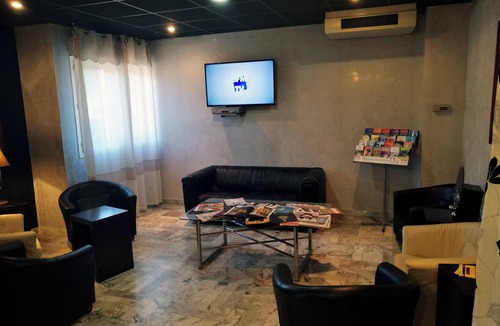 Sud Hotel | Relaxing Garden Escape | 1.1 mi to Fine Musee Tapisseries: Relax in the Sun
