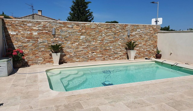 A house with no neighbors directly across the street in a small village in Provence