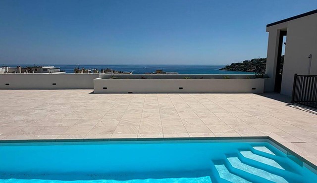 A Stunning new 2-bedroom apartment with a sea view and a large terrace