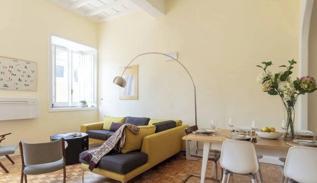 Elegant Roman Apartment with Rooftop Access & Landmark Views