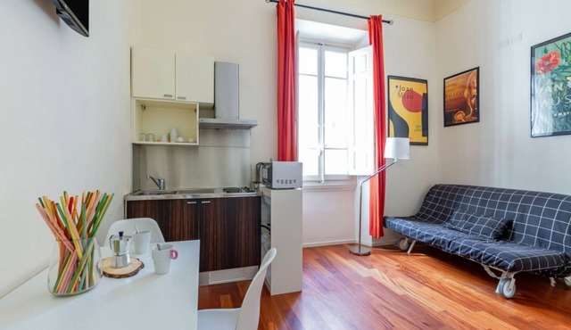 GuestHost - Cozy 35 sqm apartment, able to accommodate up to 5 people, located on the raised ground floor (5 steps to access) of an ancient building in good condition. The apartment is located in Le Cure district, a quiet residential area just north of t
