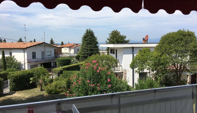 Nice apartment at the lake with a private dock and garden
