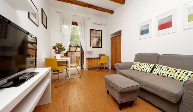 Trastevere 1BR Apt With Garden by Halldis