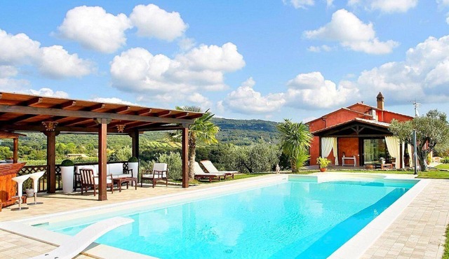 Villa Norma: An elegant and welcoming two-story villa located on top of a small hill, with Free WI-FI.