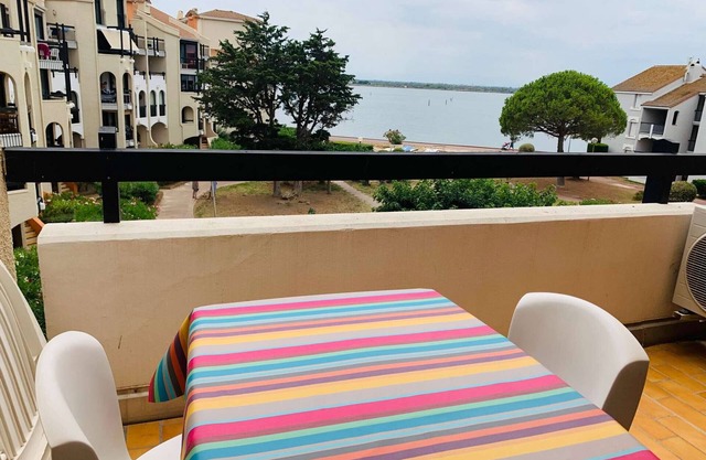 Cozy 2-Room Apartment with Terrace, Pools & Lake View - Optional AC, Fitness, Parking Included