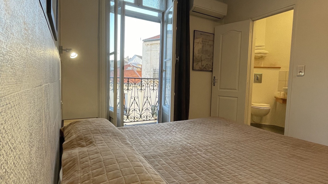 Photo of Bedroom in Comedie