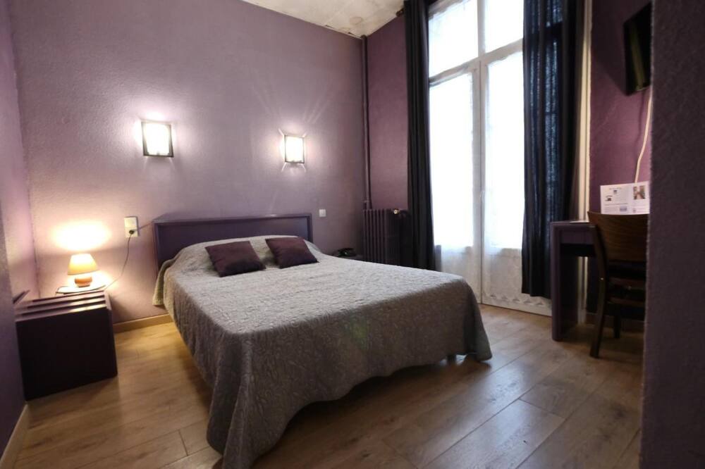 Photo of Bedroom in Comedie