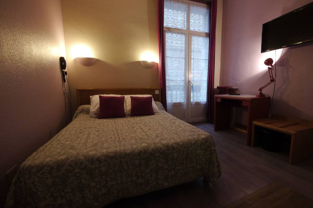 Photo of Bedroom in Comedie