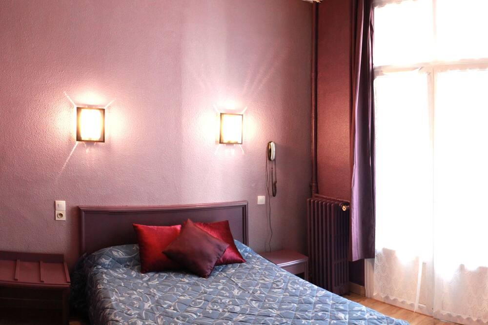 Photo of Bedroom in Comedie