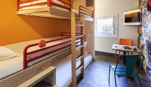 Break Room with Three Single Beds and Shared Bathroom